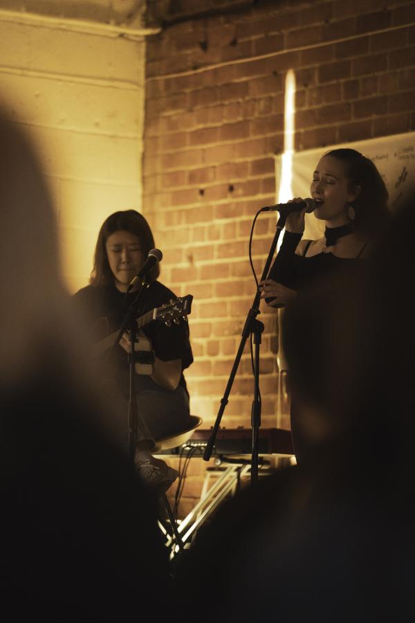 Duo performing at Sofar Sounds, Lightspace. 