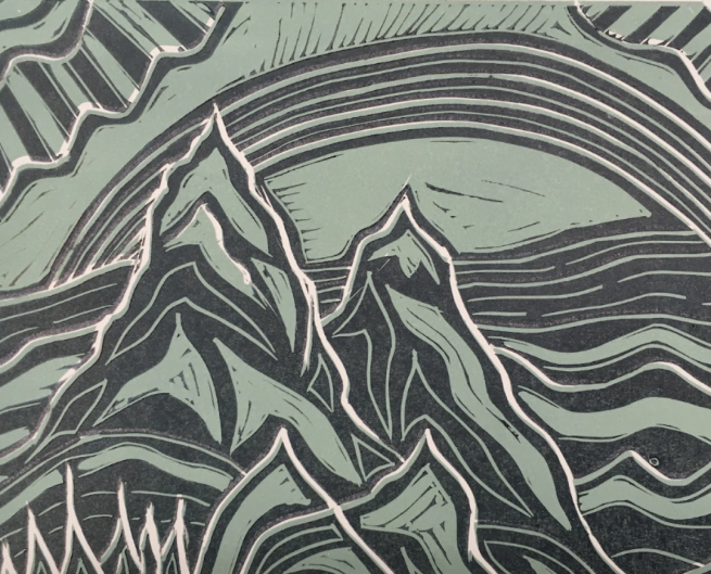 A reduction lino print depicting mountains