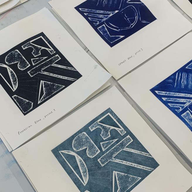 4 blue and black toned prints created using collagraph print techniques