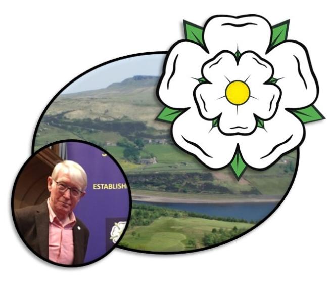 Image shows green hills and a lake with a white rose insert and photograph of Rod Dimbleby.