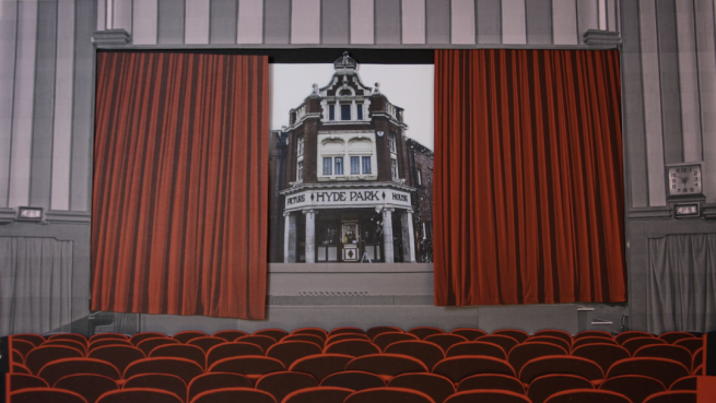 A still from an animation featuring the Hyde Park Picture House appearing behind curtains