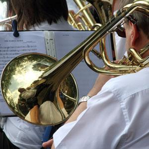 A musician performing the trombone. 