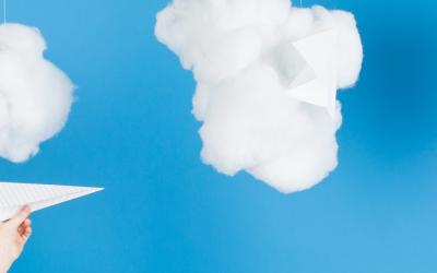cotton wool clouds and paper airplanes