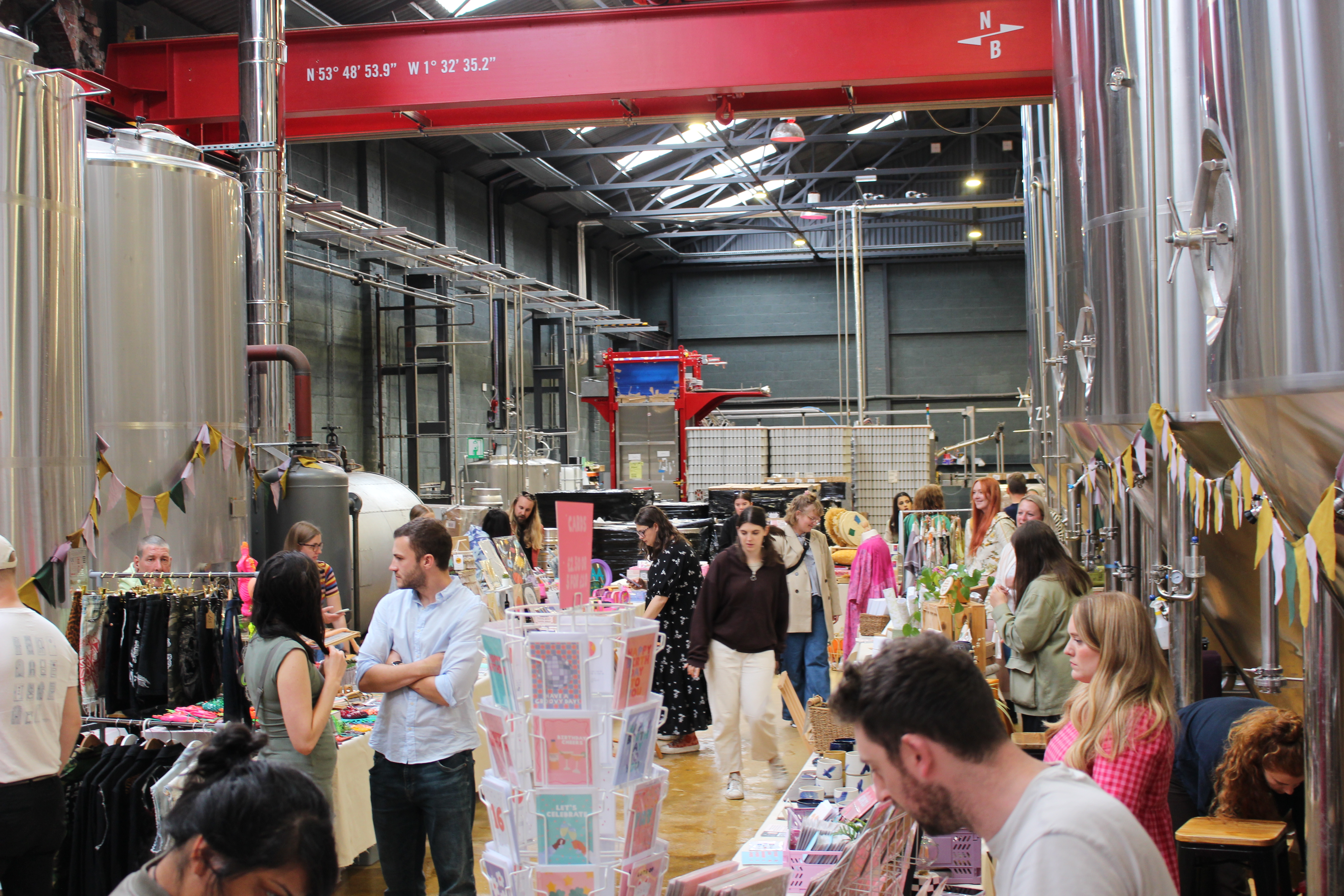 Mindful Market in full swing with shoppers browsing each stall holder.