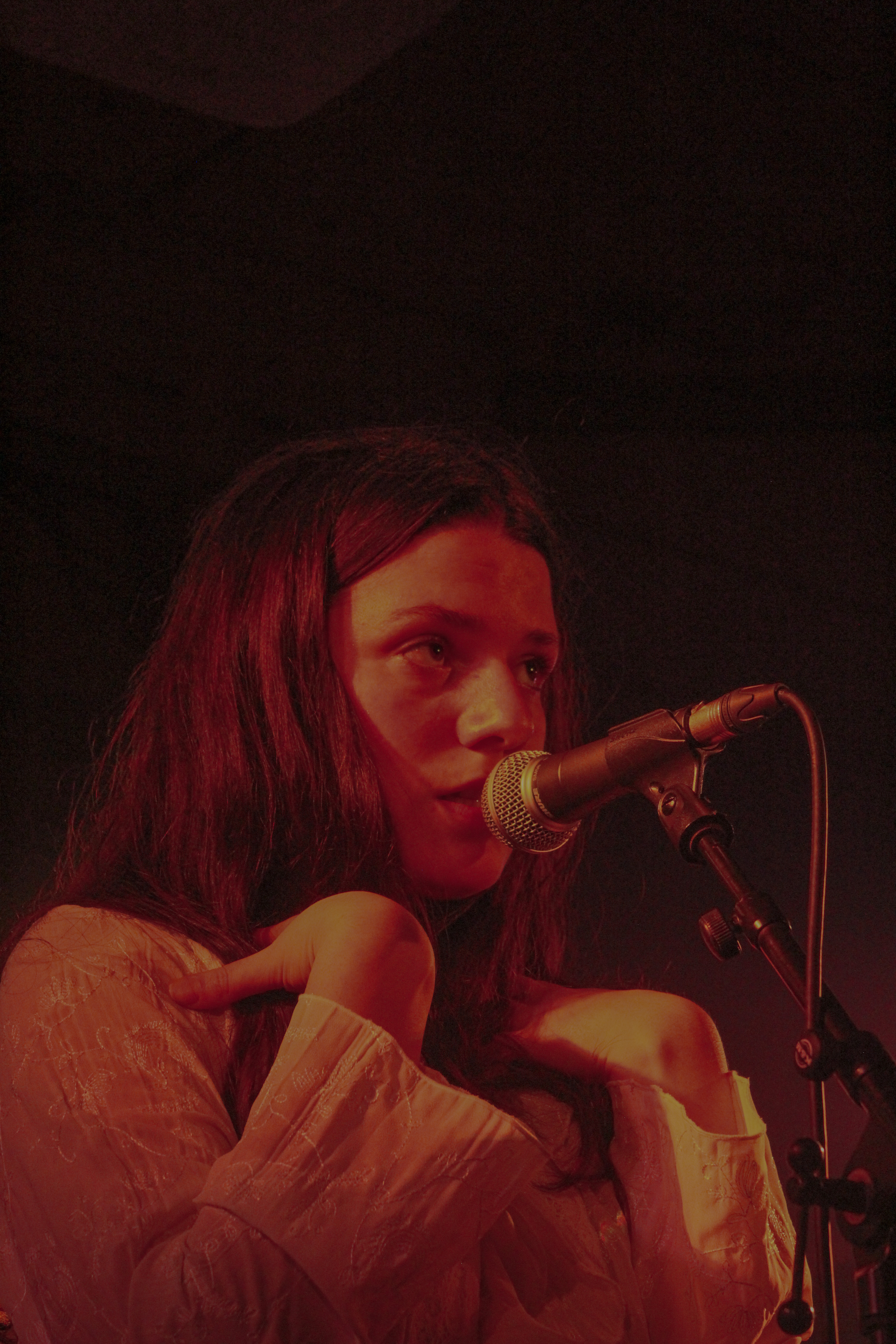 Girl singing into the microphone