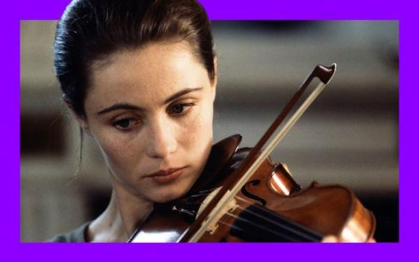 A woman playing the violin.