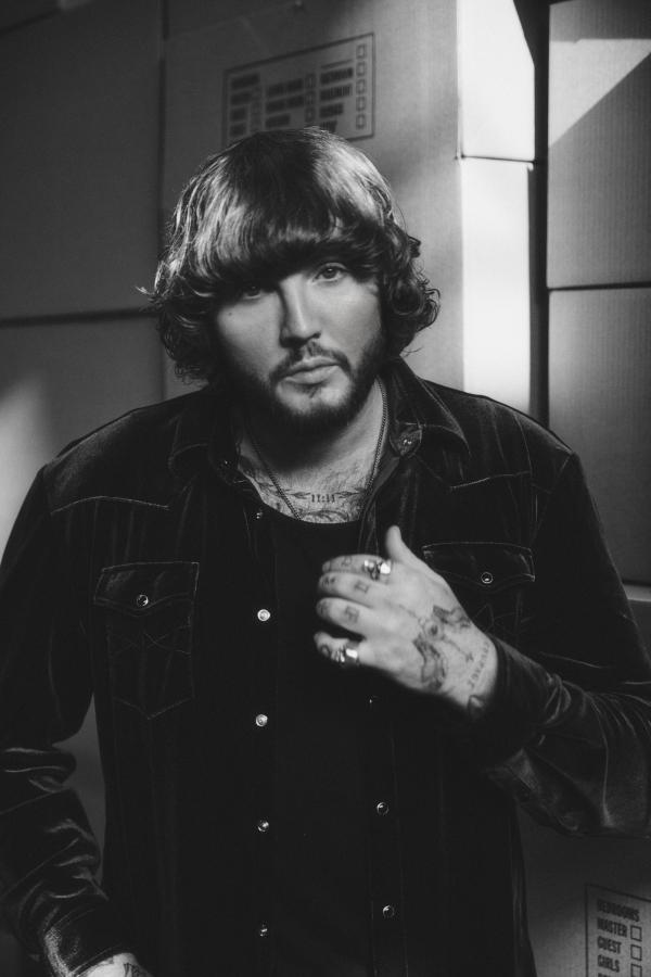 Singer James Arthur looking straight at the camera