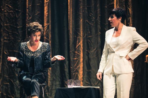 Actors playing Judy Garland and Liza Minnelli on stage.