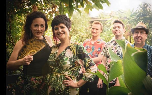 Picture of Carioca Soul musicians in a garden 