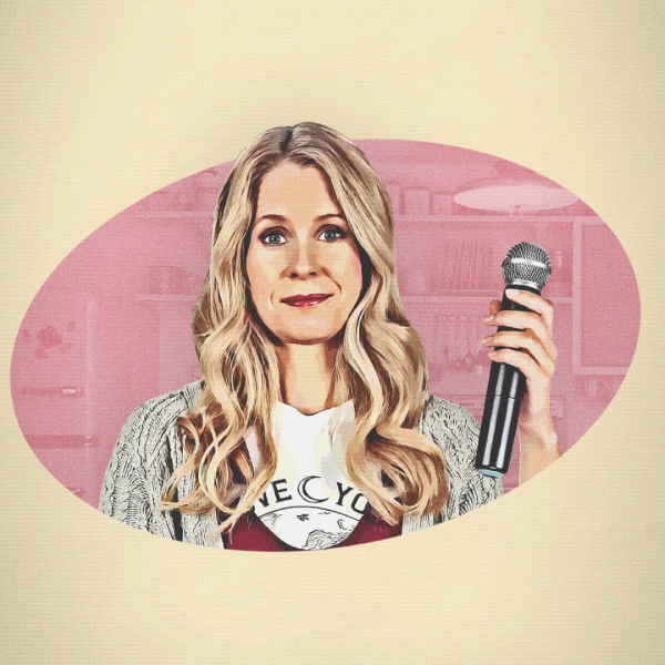 Cartoon illustration of Lucy Beaumont holding a microphone in her left hand. In dusty pink oval frame with a cream background.