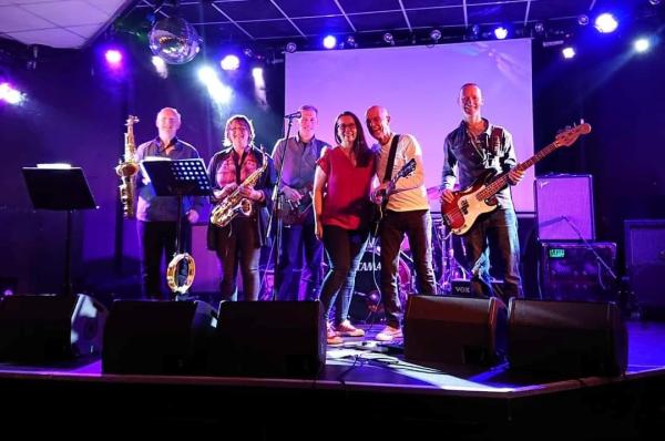 Cragg Hill Blues Band performing on a stage.