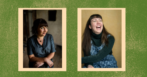 Amy J Payne and Anna Pool pictured sitting and smiling. 