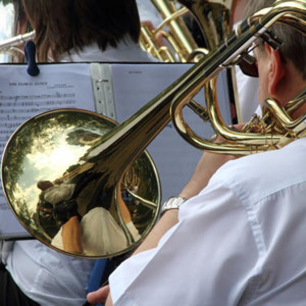 A musician performing the trombone.