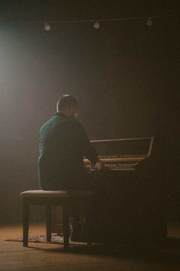 at the piano