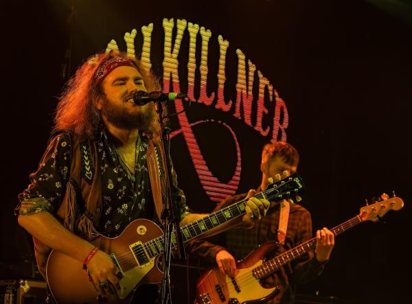 Image of Tom Killner playing live with his band