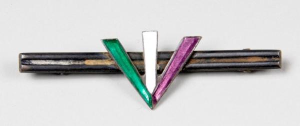 metal and enamelled bar badge with design of portcullis & Suffragette broad arrow in purple, green and white
