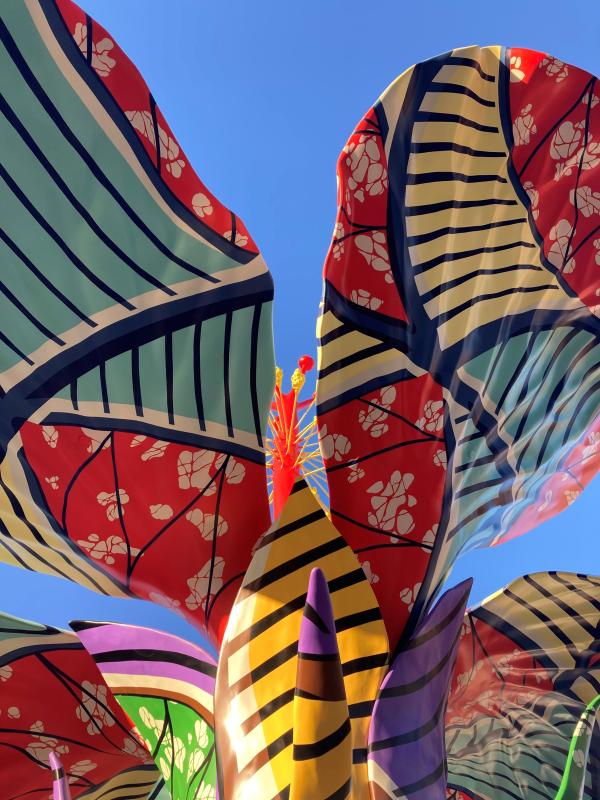 A picture of Yinka Shonibare's colourful and joyous sculpture 'Hibiscus Rising'