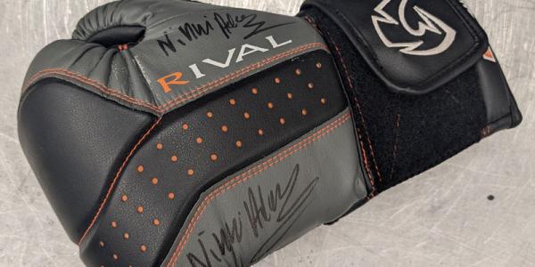 Boxing glove, signed by Leeds Boxer Nicola Adams