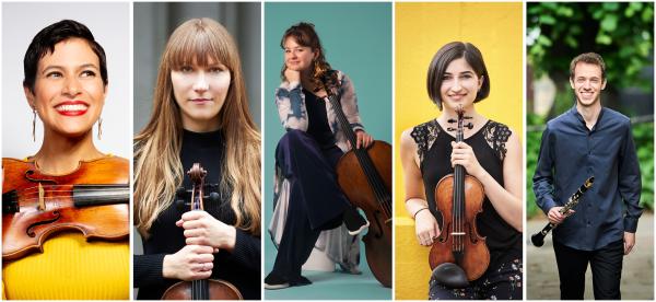 Five musicians holding their instruments.