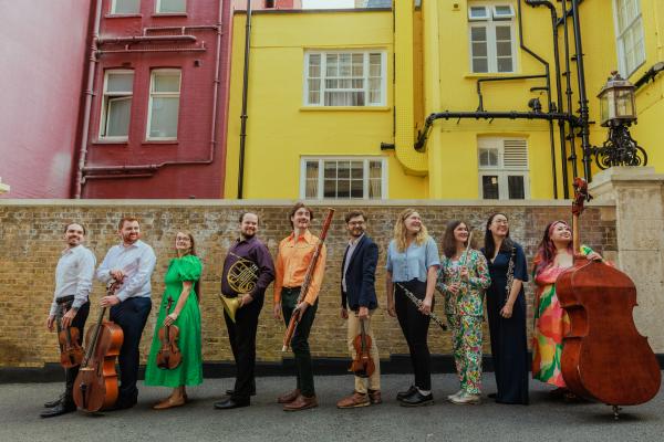 10 musicians stood in a line.