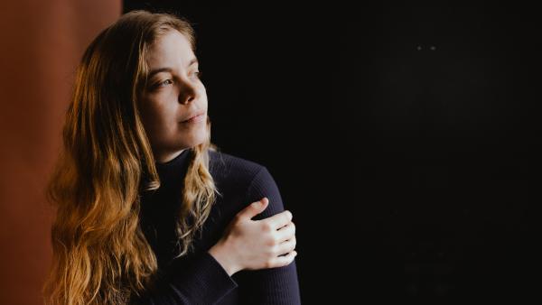 A musician looking into the distance.