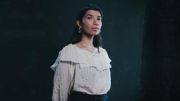 A musician looking into the distance.
