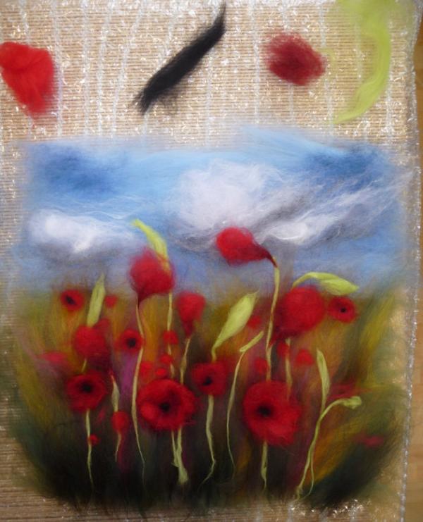 A wet felted poppy field