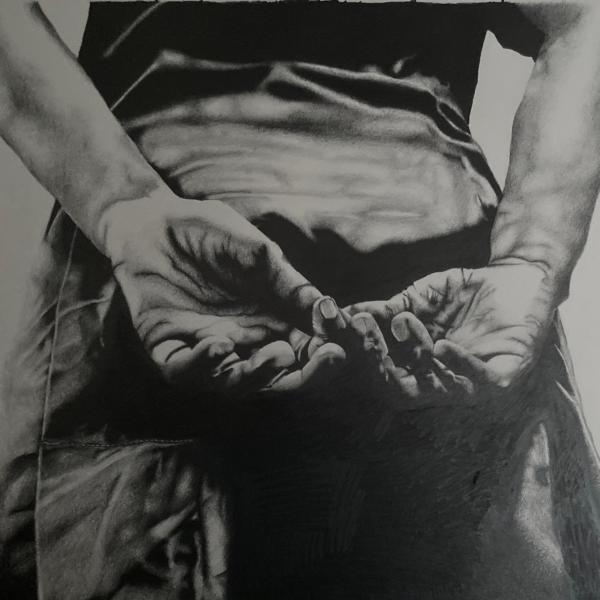 A pencil drawing of a male with their hands behind their back.