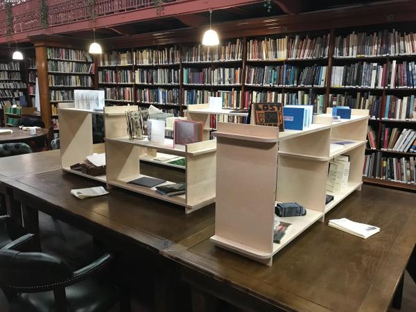 Exhibition of 28 artists' books on bespoke plywood shelving.