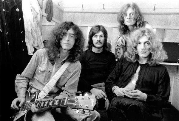 Led Zepplin sat together in a dressing room