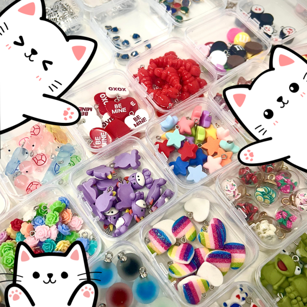 selection of charms and cartoon cats