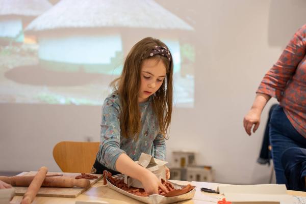 A child doing a creative activity at the Institute