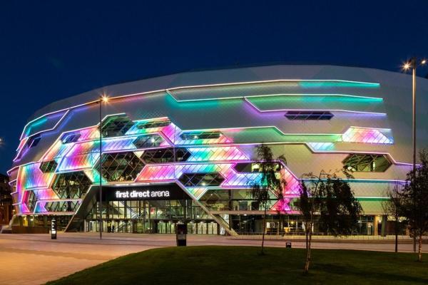 A colourful image of the exterior of Leeds First Direct Arena