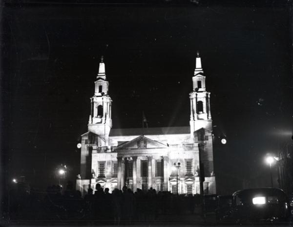 A black and white photograph of Leeds Civic Hall lit up on VJ Day (15 Aug 1945)