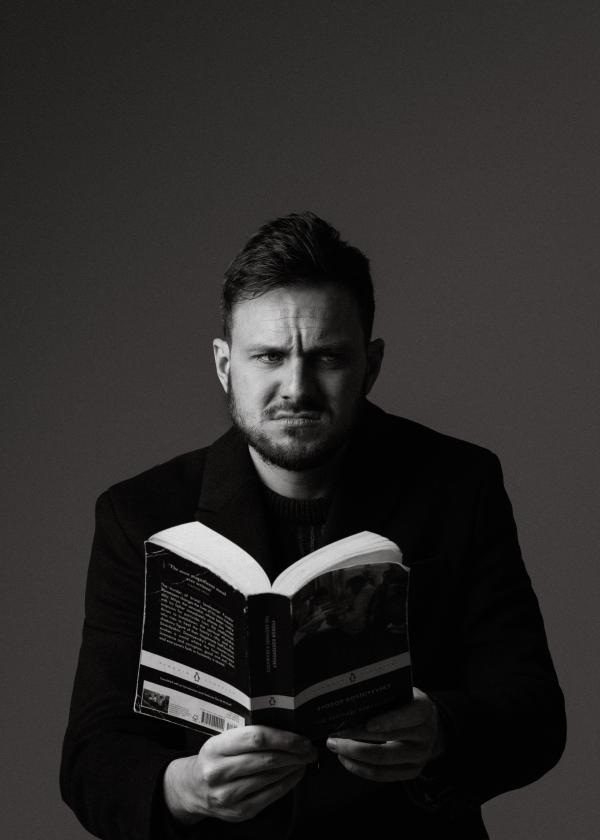 Mike Rice reading a book