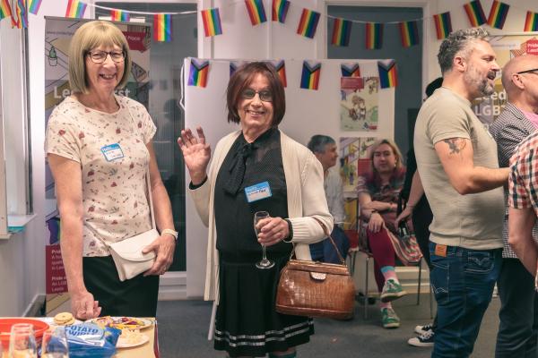 Photo of people socialising at Pride Place