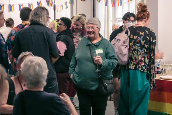 Photo of people socialising at Pride Place