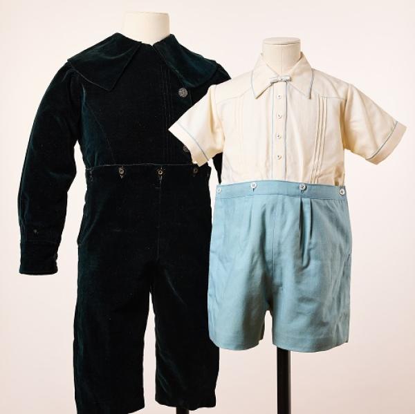 photograph of mannequins with historic children's clothes