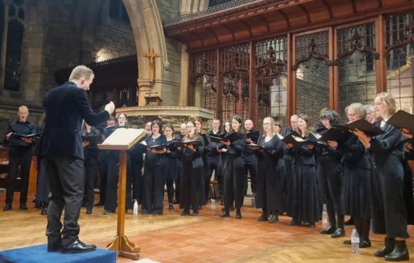 A choir performing a concert in a church