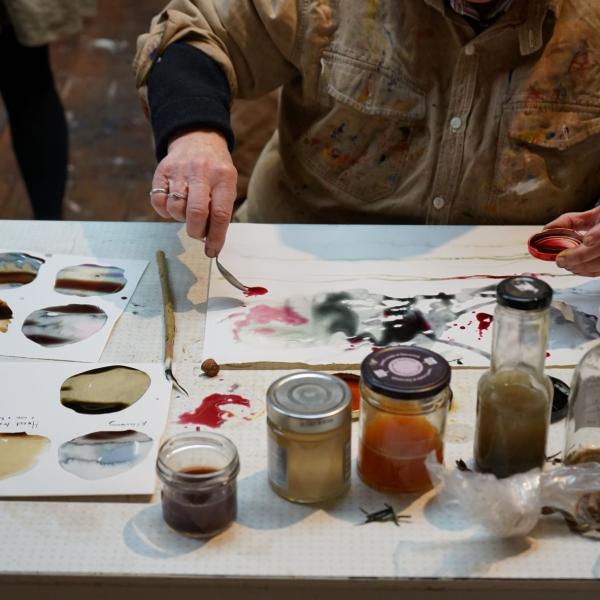 A student testing the inks made at the Ink making workshop