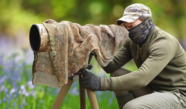 Photo of photograhpher at work in field