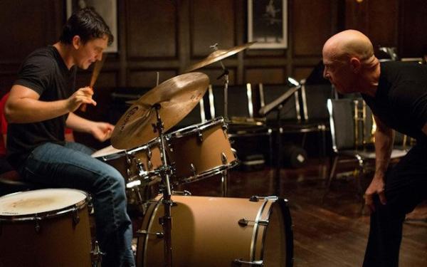 An iconic scene from the film Whiplash; Terence Fletcher aproaches Andrew Neiman menacingly as he plays the drums