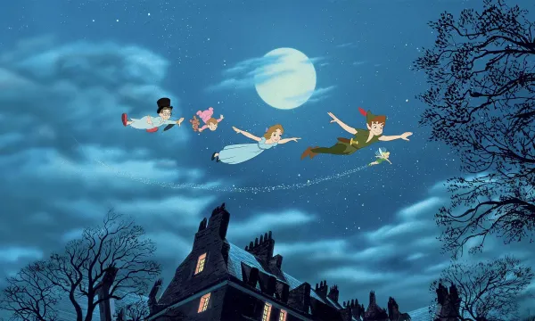 Peter Pan and his human acolytes fly through the night sky.