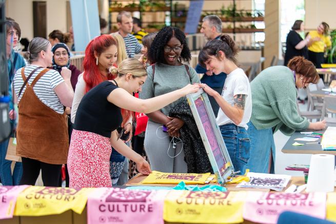 Young people screen printing