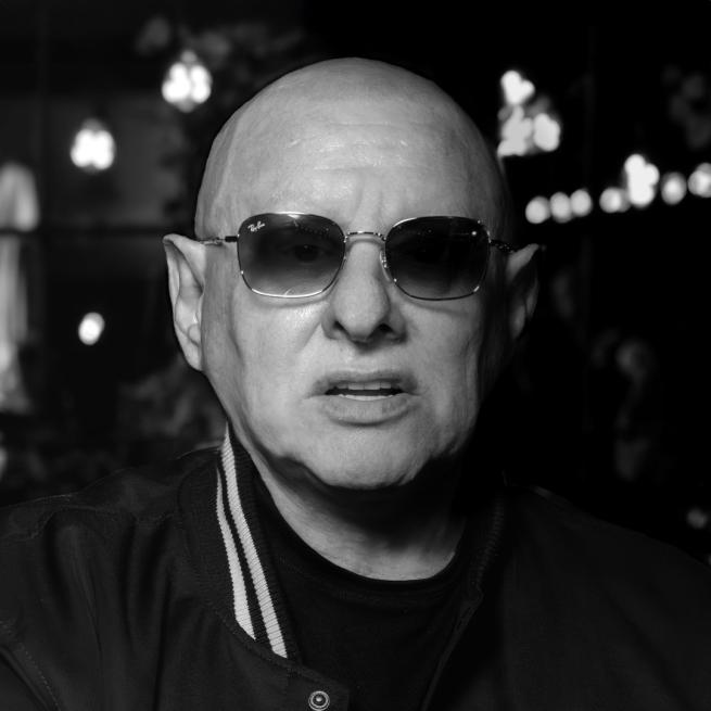 Shaun Ryder wearing sunglasses. 