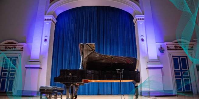 piano in an empty hall