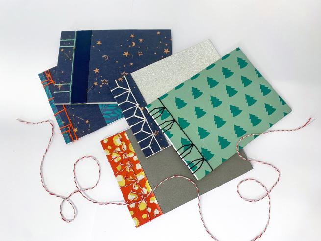 Festive bookmaking tools and materials with differing patterns on each