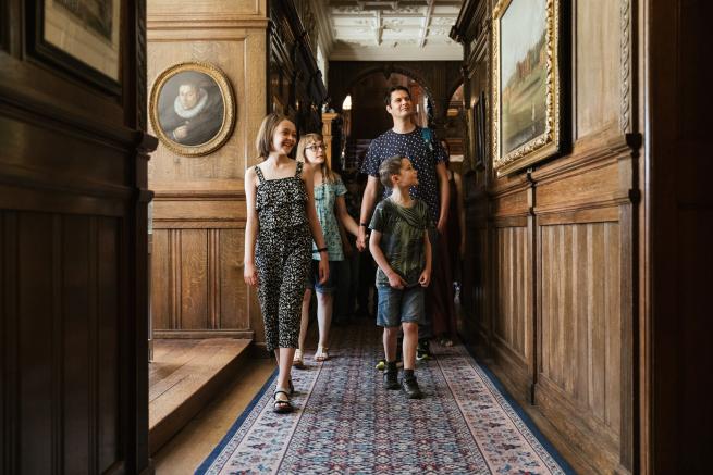 Family walking along the Oak Corridor