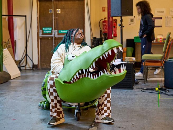 Elliotte Williams-N'Dure (The Enormous Crocodile) in rehearsals. Photography by Manuel Harlan