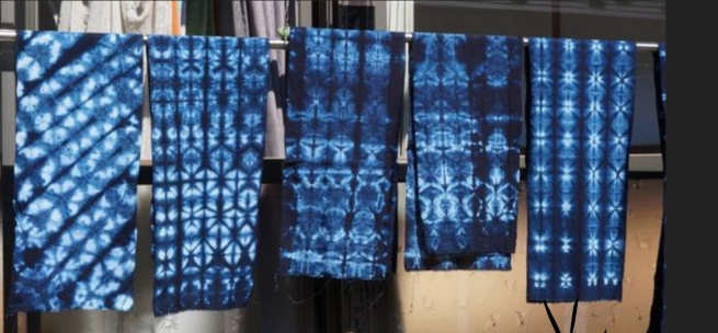 indigo dyed cloth drying on a line